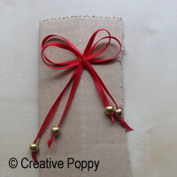 Ruban décoration Noël avec double noeud et embouts perles - étape 2c