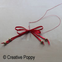 Ruban décoration Noël avec double noeud et embouts perles - étape 3b